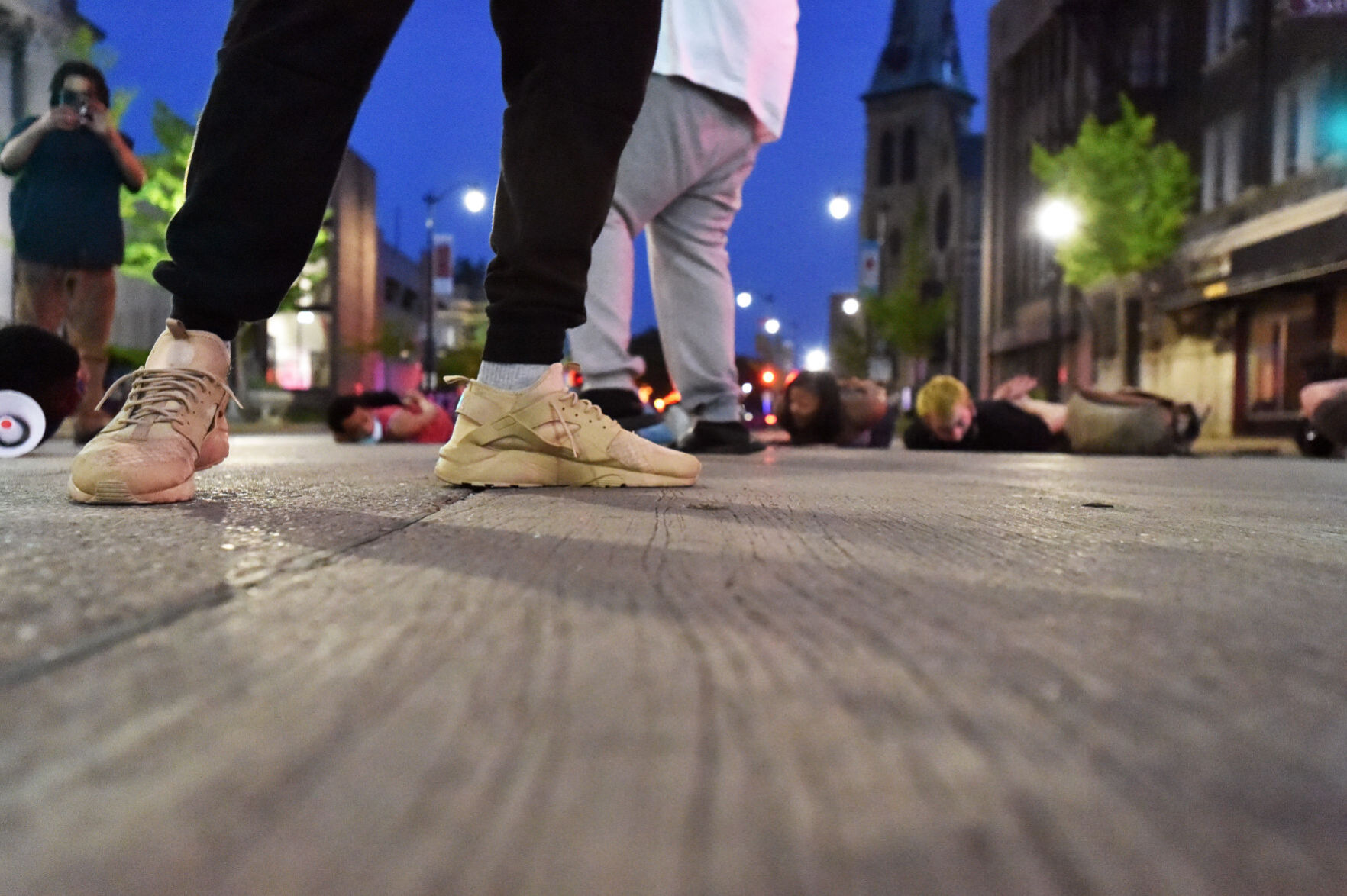 Protesters lay down on Main Street, recalling George Floyd's last moments
